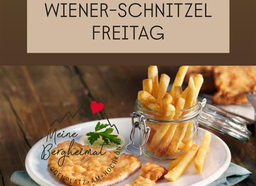 Wiener Schnitzel mit Pommes frites auf einem Teller. Oben steht "Wiener-Schnitzel Freitag".